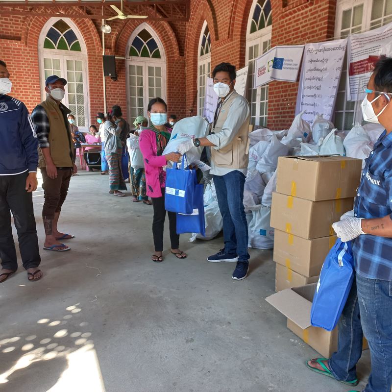 A woman recently displaced by fighting in Kachin receives hygiene, dignity and COVID-19 kit to support her and her family while displaced in a temporary and safe site.
