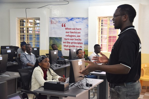 A tutor from Ajira/eMobilis leading part of the 99 youths in the digital skills training at the digital youth empowerment centre in Eastleigh, Kenya.